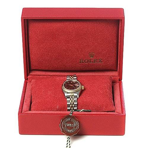 The image shows a Rolex Datejust 69173 Women's Stainless Steel Black Dial 69173 Women's Stainless Steel Black Dial watch placed in an open red Rolex box, with the watch facing upwards.