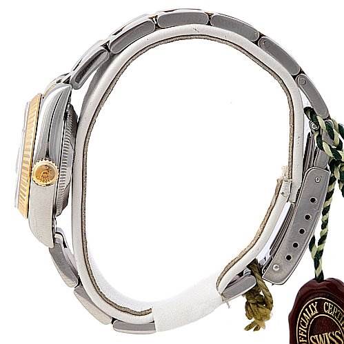 The image shows a side profile of a Rolex Datejust 69173 Women's Stainless Steel White Dial 69173 Women's Stainless Steel White Dial watch, highlighting the band, case, and crown.