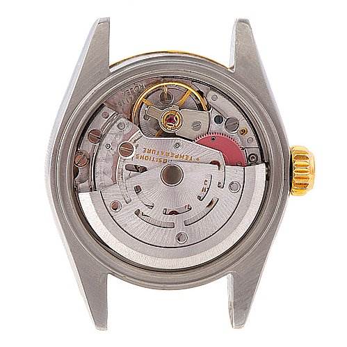 This image shows the backside angle of a Rolex Datejust 69173 Women's Stainless Steel White Dial 69173 Women's Stainless Steel White Dial watch, displaying its intricate internal movement components.