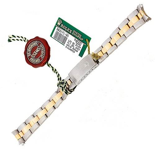 The image displays the bracelet and tags of a Rolex Datejust 69173 Women's Stainless Steel White Dial 69173 Women's Stainless Steel White Dial watch, showcasing a two-tone metal design and its clasp.