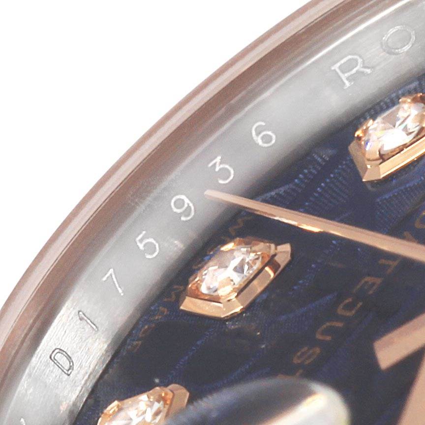 The image shows a close-up of a Rolex Datejust 179171 Women
s Steel and Gold (two tone) Blue Dial 179171 Women
s Steel and Gold (two tone) Blue Dial watch face highlighting the hour markers, partial hands, and the serial number.
