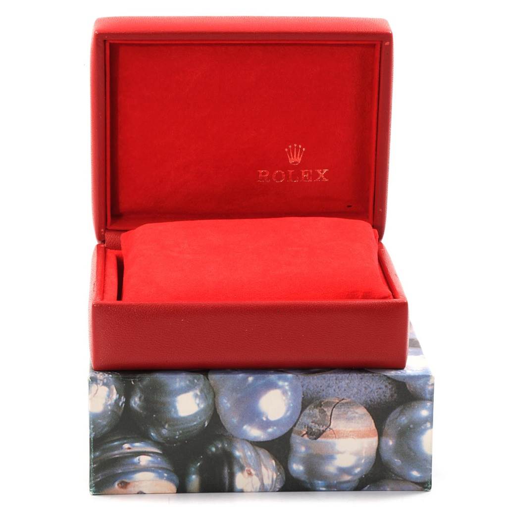 This image shows a red Rolex Datejust 69160 Women's Stainless Steel Black Dial 69160 Women's Stainless Steel Black Dial watch box from the front angle, with the lid open and the interior visible.
