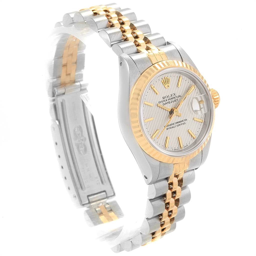 The Rolex Datejust 69173 Women's Stainless Steel Silver Dial 69173 Women's Stainless Steel Silver Dial watch is shown at an angle displaying its face, bezel, and bi-metal bracelet.