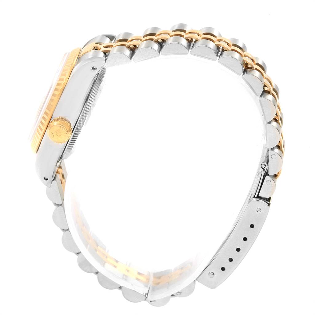 This image shows a side view of a Rolex Datejust 69173 Women's Stainless Steel Silver Dial 69173 Women's Stainless Steel Silver Dial watch, highlighting the crown, bezel, and bracelet.