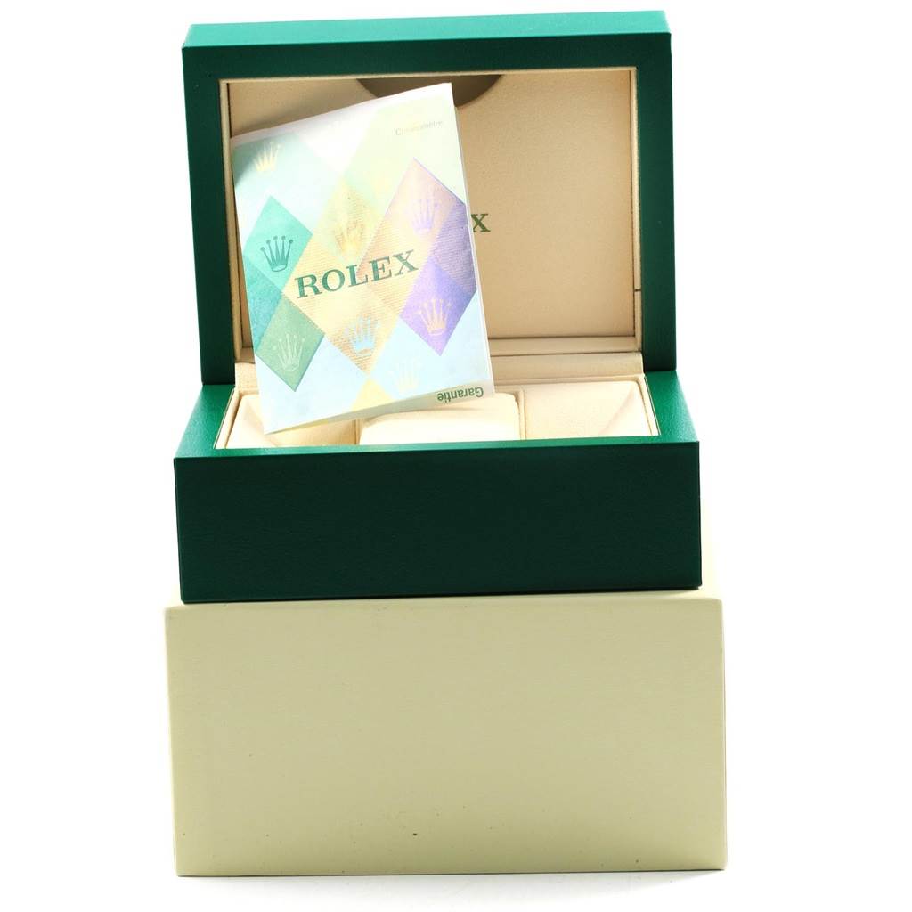 The image shows an open green Rolex Datejust 179171 Women's Steel and Gold (two tone) Black Dial 179171 Women's Steel and Gold (two tone) Black Dial watch box with a Rolex certificate inside.