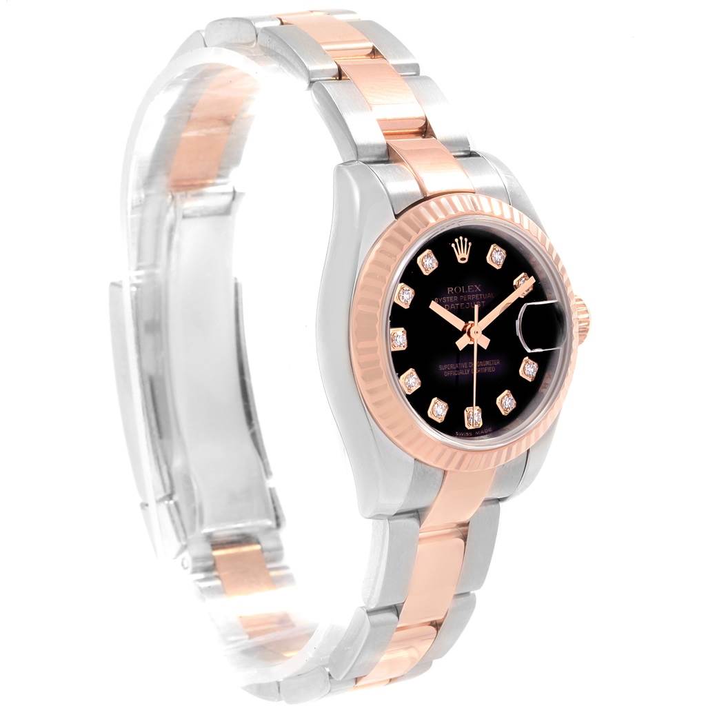 This image shows the Rolex Datejust 179171 Women's Steel and Gold (two tone) Black Dial 179171 Women's Steel and Gold (two tone) Black Dial watch at a slight left-side angle, highlighting the two-tone bracelet, black dial, and fluted bezel.