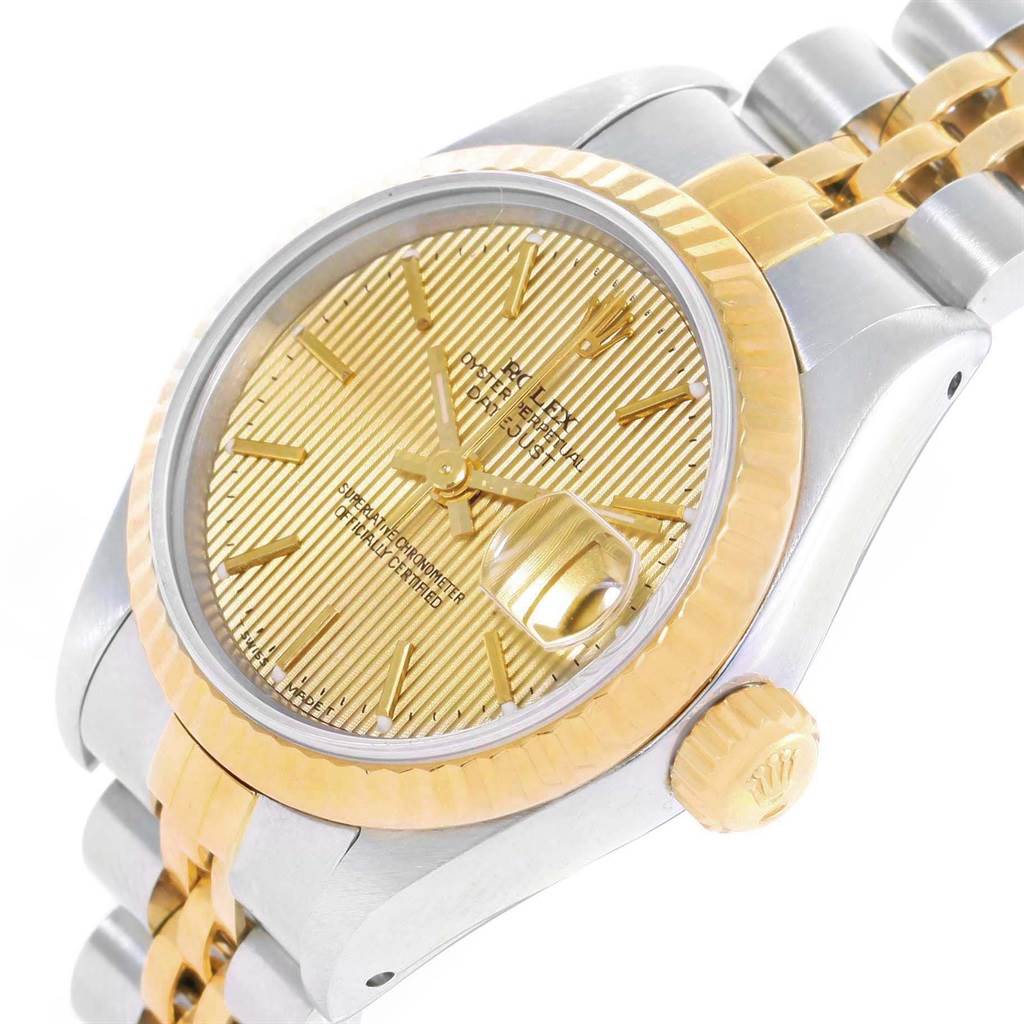 The image shows a close-up, angled view of a Rolex Datejust 69173 Women
s Stainless Steel Champagne Dial 69173 Women
s Stainless Steel Champagne Dial watch, displaying the dial, bezel, and part of the bracelet and crown.