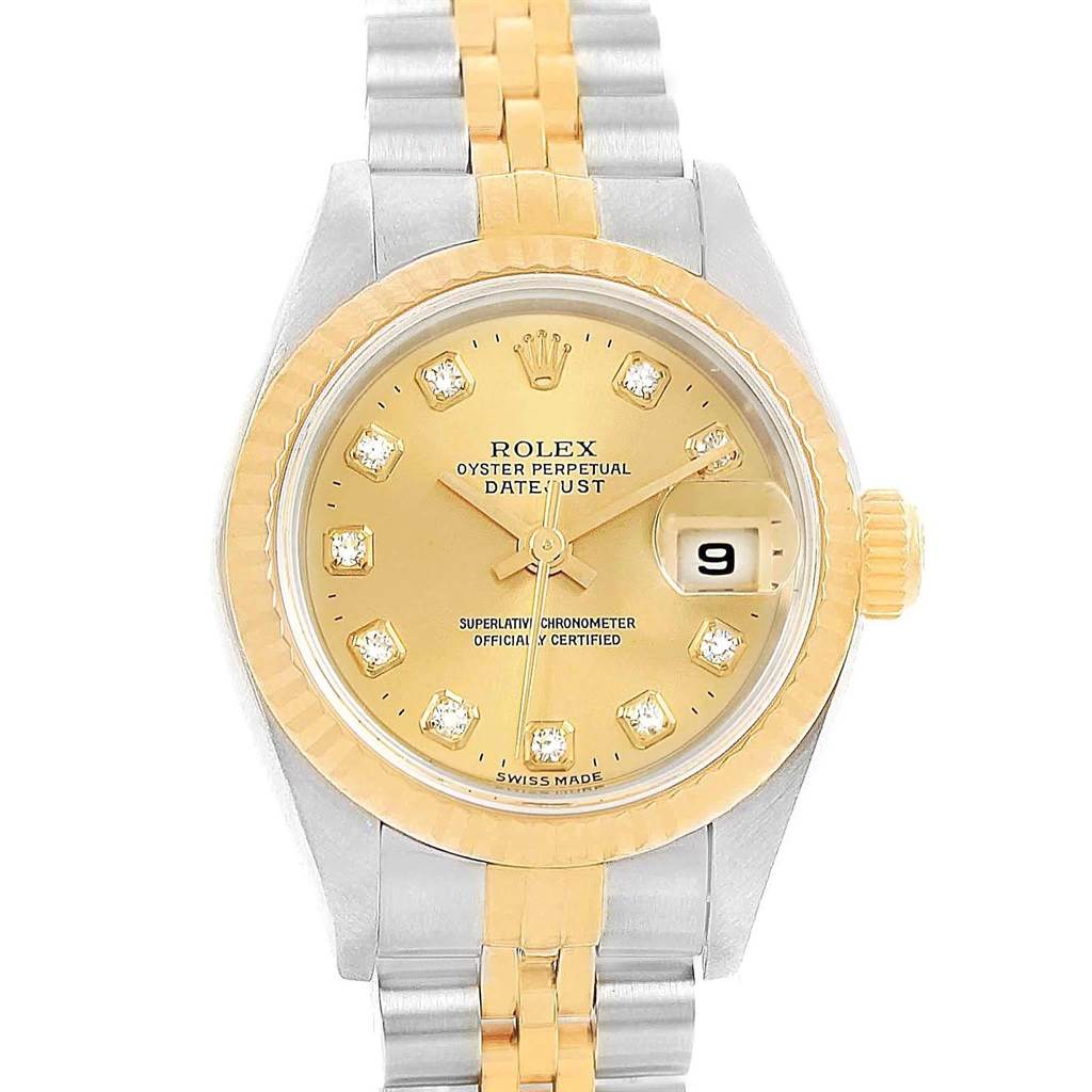 The Rolex Datejust 69173 Women's Stainless Steel Champagne Dial 69173 Women's Stainless Steel Champagne Dial watch is shown from a front view, displaying the gold face, diamond markers, gold bezel, and two-tone bracelet.