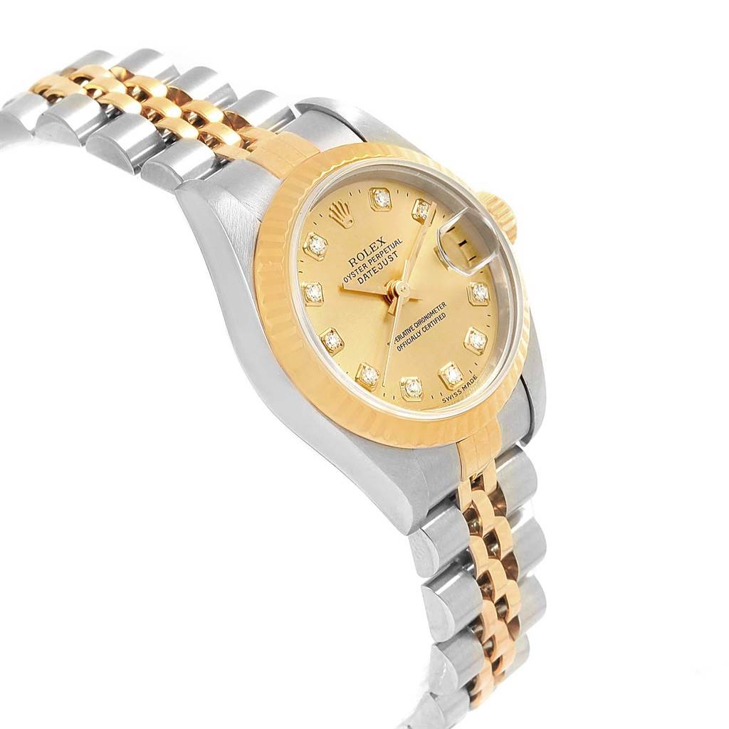 The image shows a side angle of a Rolex Datejust 69173 Women's Stainless Steel Champagne Dial 69173 Women's Stainless Steel Champagne Dial watch, highlighting its two-tone strap and gold dial with date display.