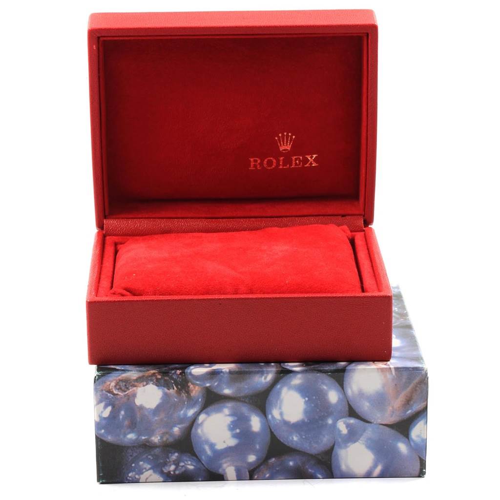 The image shows a red Rolex Datejust 69173 Women's Stainless Steel Champagne Dial 69173 Women's Stainless Steel Champagne Dial watch box with a cushion inside, angled slightly from the front.