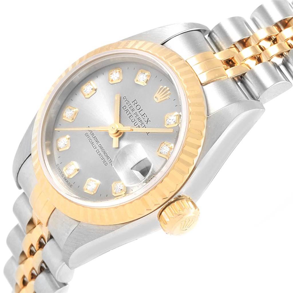 The image shows a tilted angle of the Rolex Datejust 69173 Women's Stainless Steel Silver Dial 69173 Women's Stainless Steel Silver Dial watch, highlighting its face, bezel, crown, and bracelet.