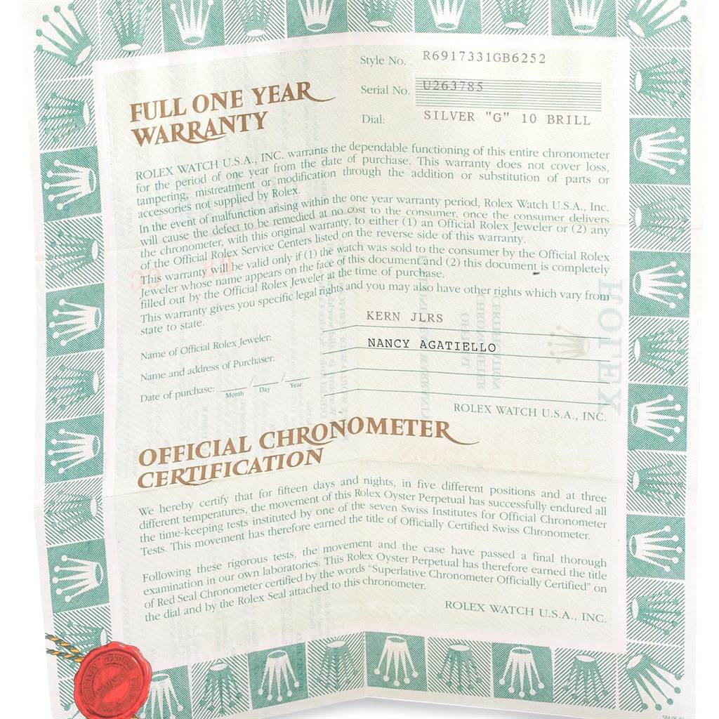 The image shows a warranty and certification document for a Rolex Datejust 69173 Women's Stainless Steel Silver Dial 69173 Women's Stainless Steel Silver Dial model watch.