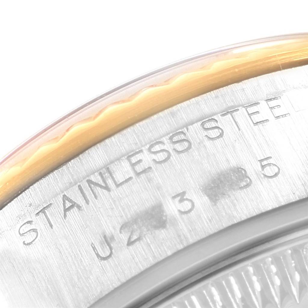 This close-up image shows the case back and serial number of a Rolex Datejust 69173 Women's Stainless Steel Silver Dial 69173 Women's Stainless Steel Silver Dial, emphasizing the "STAINLESS STEEL" engraving.