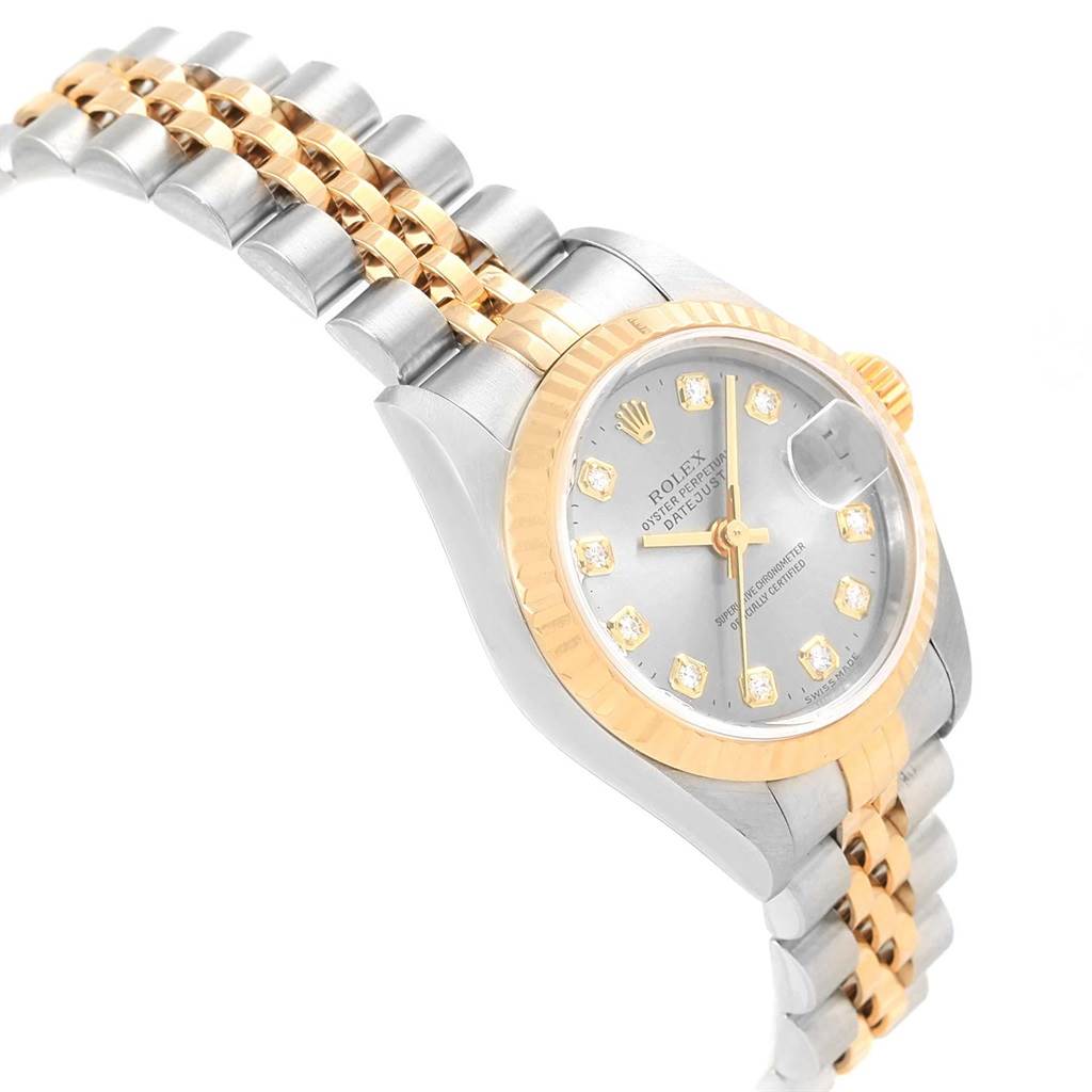 The image shows a Rolex Datejust 69173 Women's Stainless Steel Silver Dial 69173 Women's Stainless Steel Silver Dial watch at an oblique angle, highlighting its two-tone bracelet, fluted bezel, and diamond hour markers.