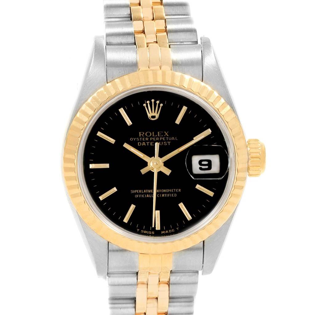 This is a close-up view of the Rolex Datejust 69173 Women's Stainless Steel Black Dial 69173 Women's Stainless Steel Black Dial watch, showing the dial, bezel, and parts of the bracelet.