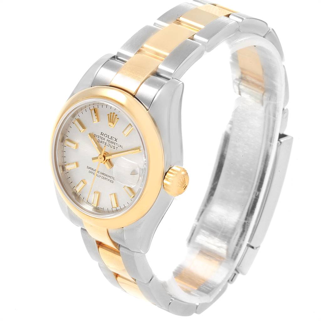 The image shows a Rolex Datejust 179163 Women's Steel and Gold (two tone) Silver Dial 179163 Women's Steel and Gold (two tone) Silver Dial watch at an angle, featuring its two-tone band, face, bezel, and crown.