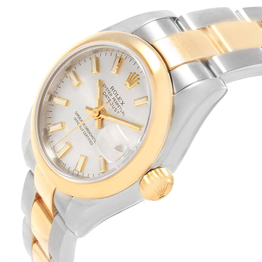 This is a close-up of a Rolex Datejust 179163 Women's Steel and Gold (two tone) Silver Dial 179163 Women's Steel and Gold (two tone) Silver Dial watch showing the dial, bezel, crown, and part of the bracelet at an angled side view.