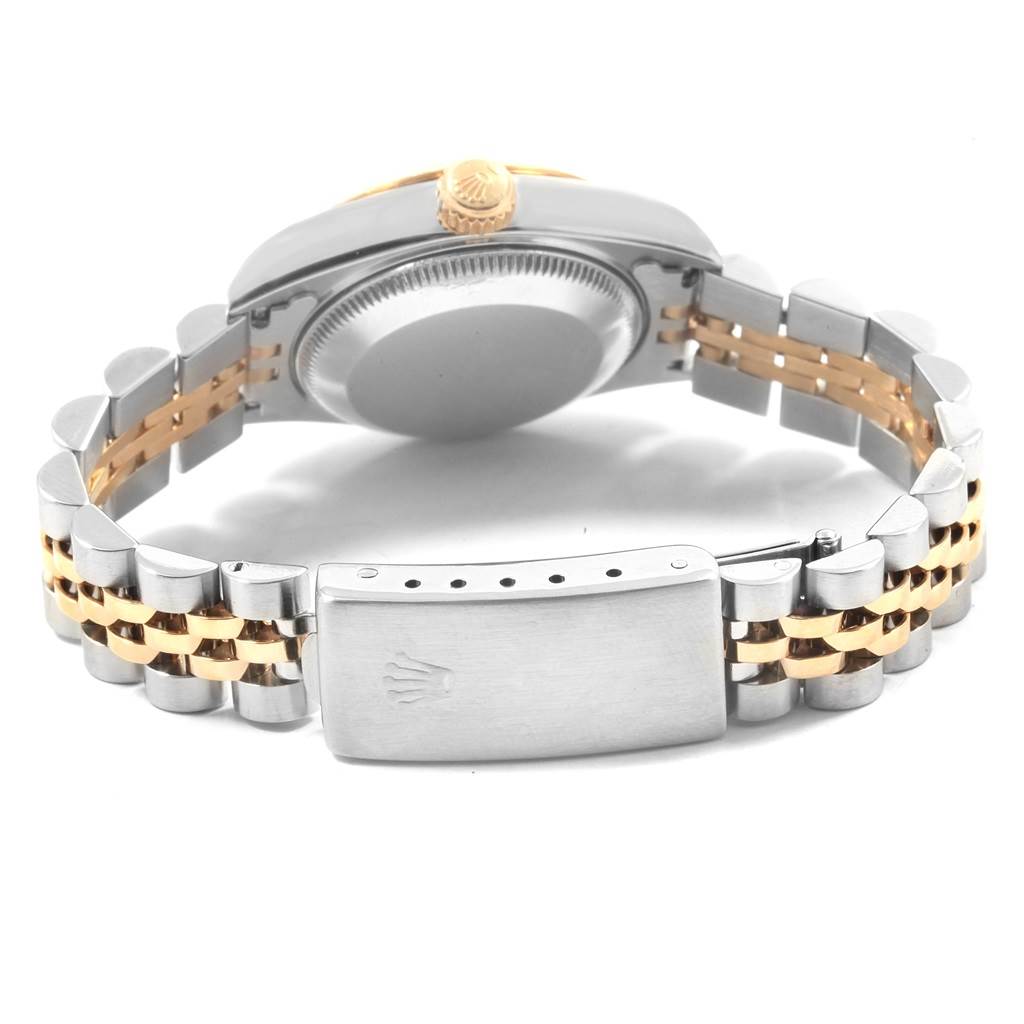 Shown is a Rolex Datejust 69173 Women's Stainless Steel Silver Dial 69173 Women's Stainless Steel Silver Dial watch from the back, highlighting the bracelet, clasp, case back, and crown.