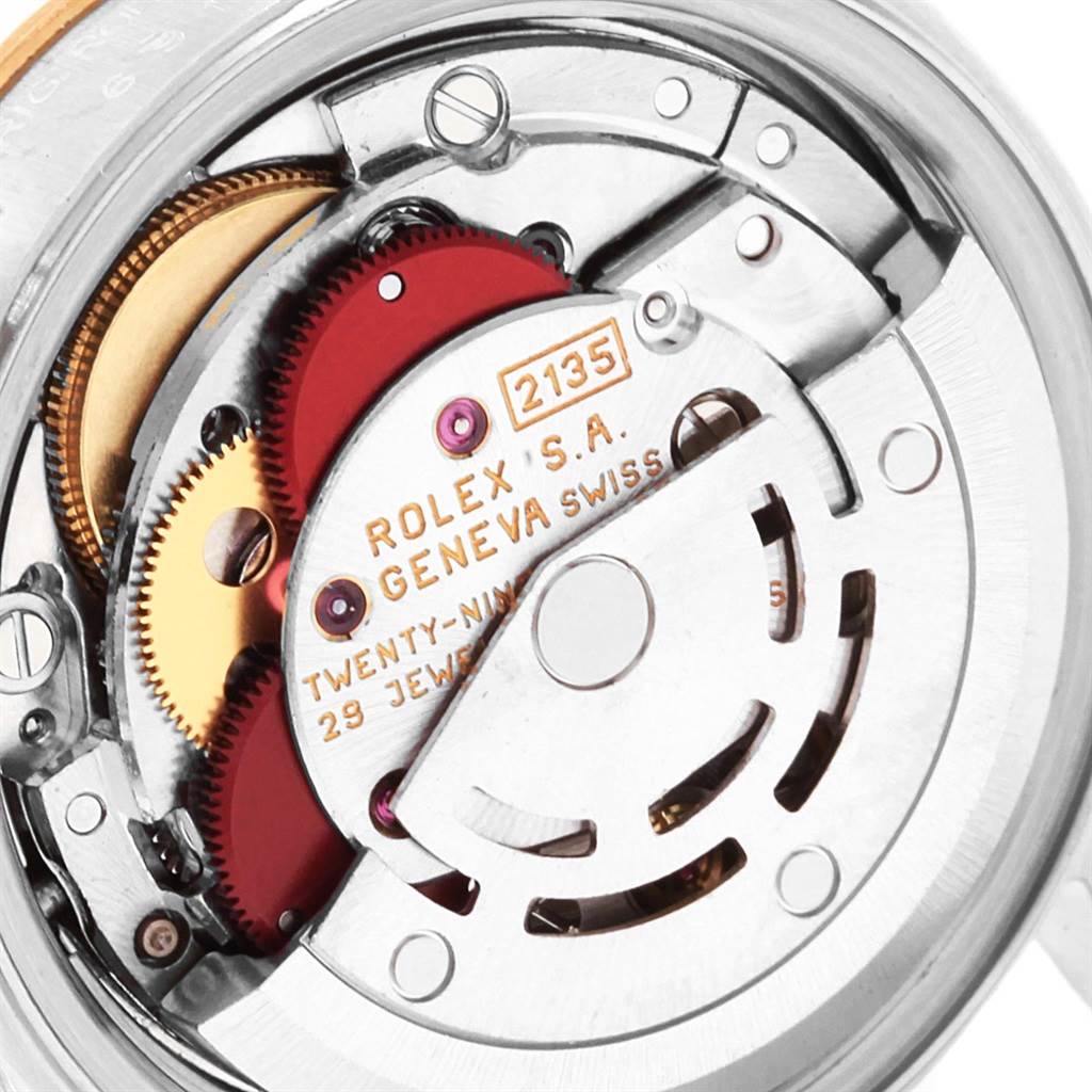 This image shows a close-up of the movement mechanism inside a Rolex Datejust 69173 Women's Stainless Steel Black Dial 69173 Women's Stainless Steel Black Dial watch.