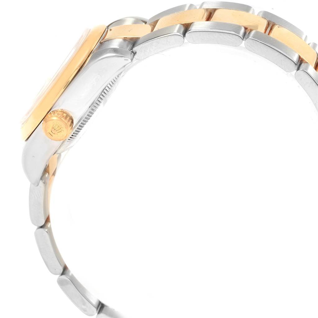 The image shows a side view of a Datejust model by Rolex, highlighting the crown, side case, and part of the bracelet.