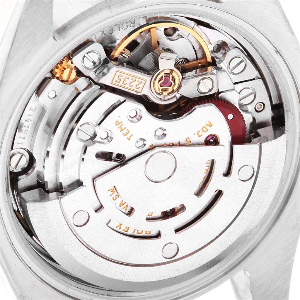 This image shows a close-up view of the Rolex Datejust 179163 Women's Steel and Gold (two tone) Mother of Pearl Dial 179163 Women's Steel and Gold (two tone) Mother of Pearl Dial watch’s internal movement mechanism.