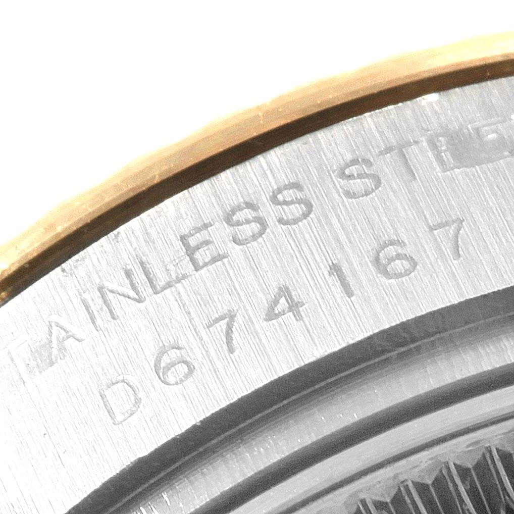 This image shows a close-up of the stainless steel case back with serial number details on a Rolex Datejust 179173 Women's Steel and Gold (two tone) Mother of Pearl Dial 179173 Women's Steel and Gold (two tone) Mother of Pearl Dial watch.