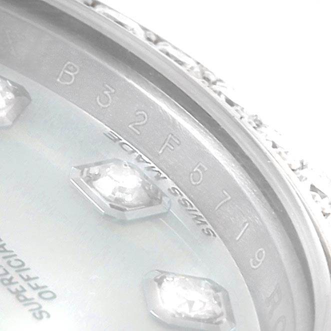 The image shows a close-up of the dial and serial number area of a Rolex Datejust 179384 Women's Stainless Steel Mother of Pearl Dial 179384 Women's Stainless Steel Mother of Pearl Dial watch, highlighting the diamonds and part of the bezel.