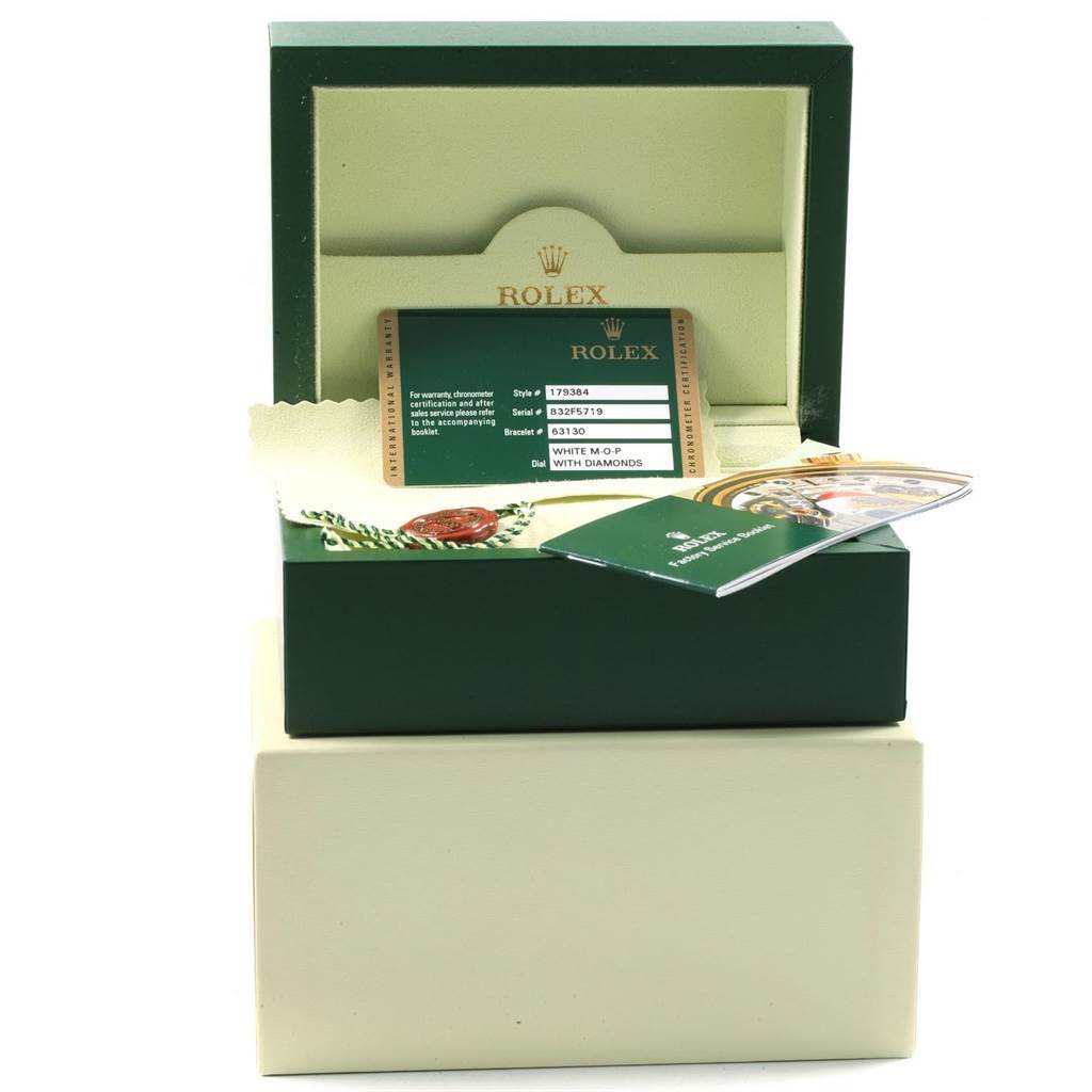 The image features the packaging, warranty card, and documentation for a Rolex Datejust 179384 Women's Stainless Steel Mother of Pearl Dial 179384 Women's Stainless Steel Mother of Pearl Dial watch, but not the watch itself.