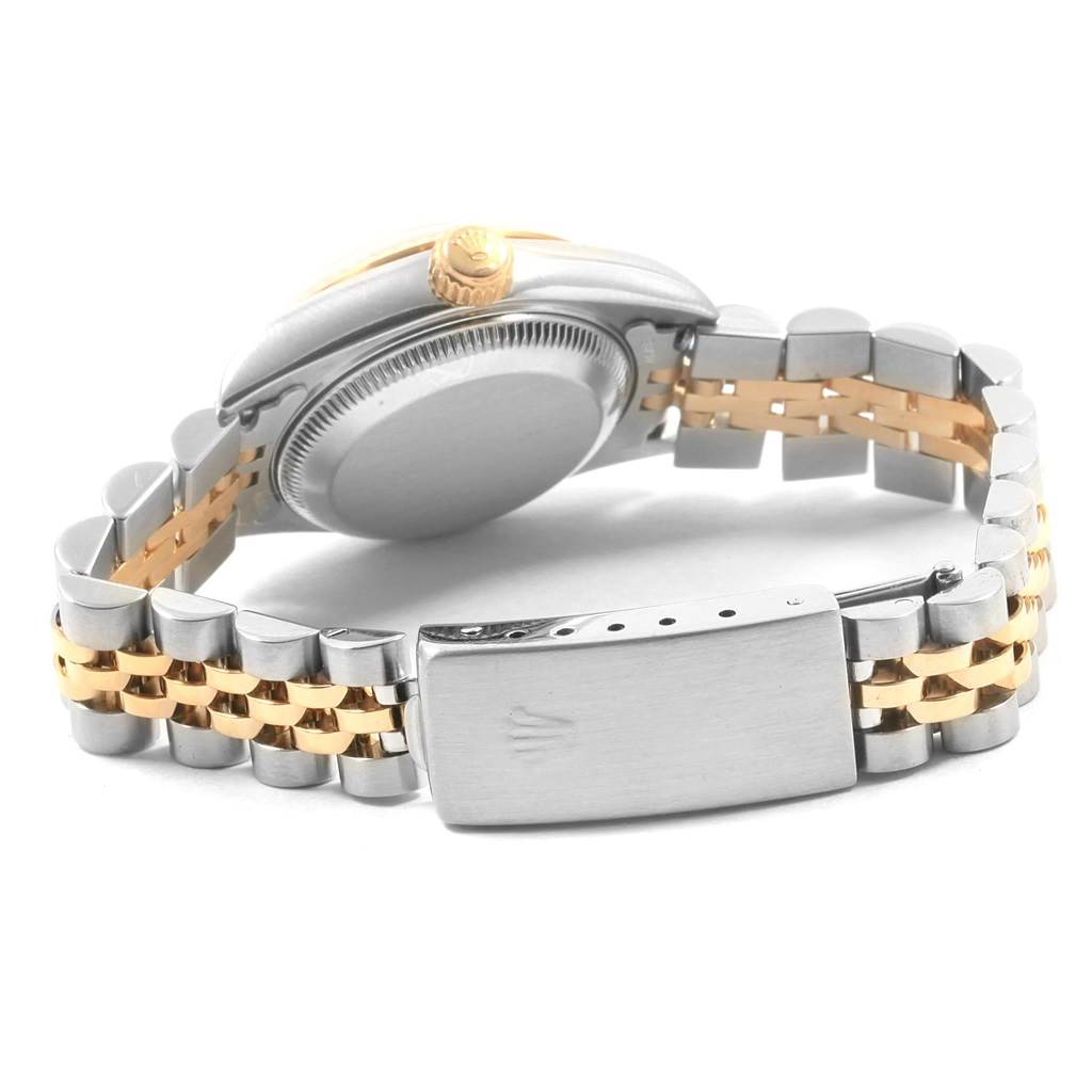 The image shows the back and side view of a Rolex Datejust 69173 Women's Stainless Steel Champagne Dial 69173 Women's Stainless Steel Champagne Dial, featuring its case back, crown, and two-tone Jubilee bracelet with a clasp.
