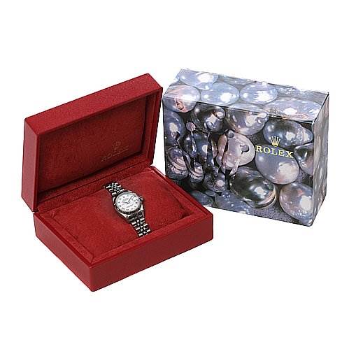 This image shows a Rolex Datejust 79174 Women
s Stainless Steel White Dial 79174 Women
s Stainless Steel White Dial watch displayed in a red box with an accompanying decorative outer box beside it.