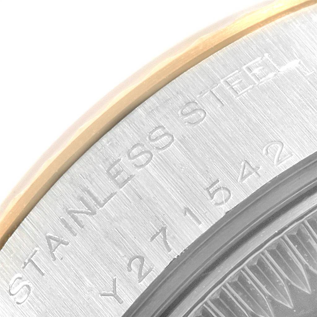 This image shows a close-up of the bezel and casing with "STAINLESS STEEL" engraved on the Rolex Datejust 79173 Women's Steel and Gold (two tone) White Dial 79173 Women's Steel and Gold (two tone) White Dial watch.