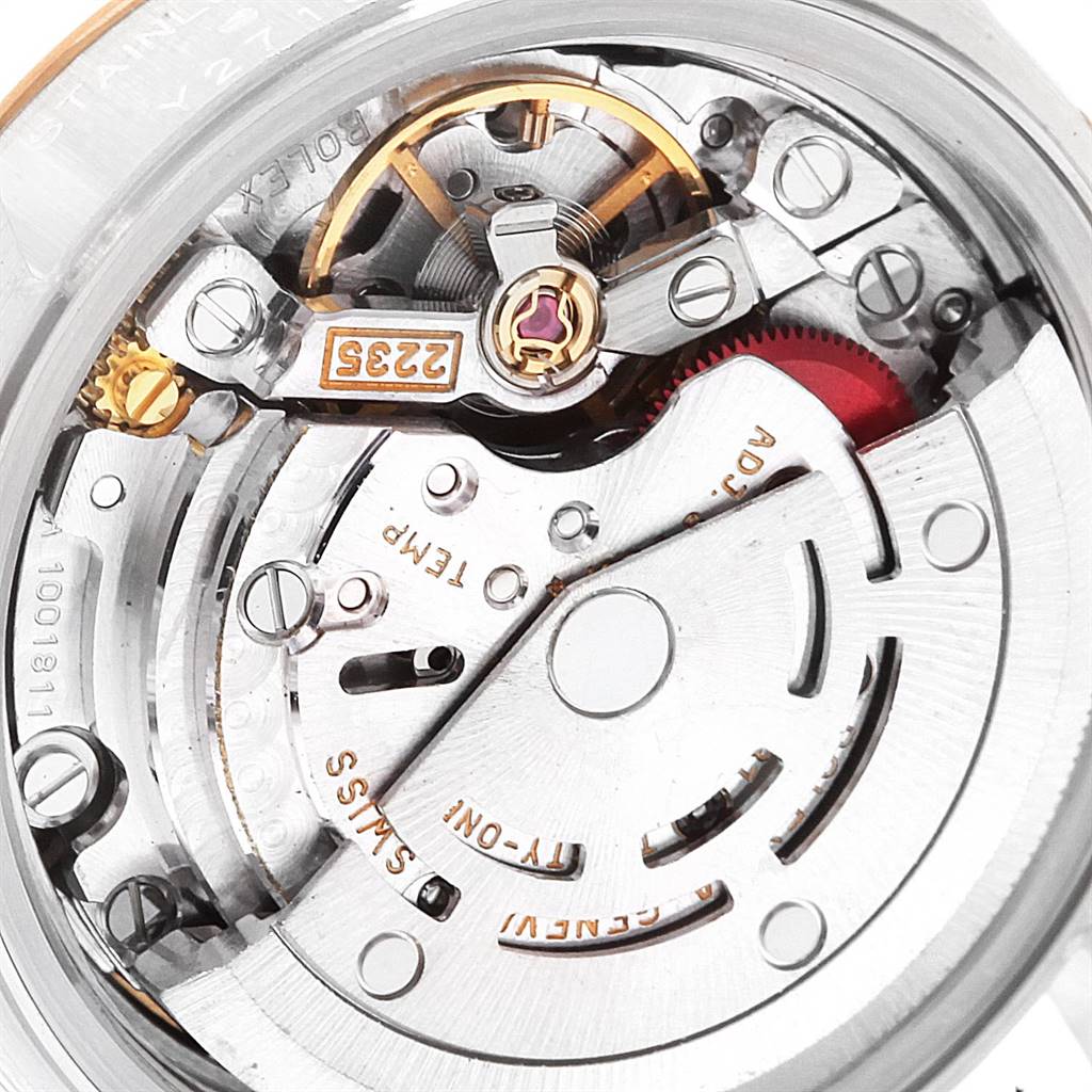 The image shows a close-up view of the movement inside a Rolex Datejust 79173 Women's Steel and Gold (two tone) White Dial 79173 Women's Steel and Gold (two tone) White Dial watch, highlighting its intricate mechanical parts.