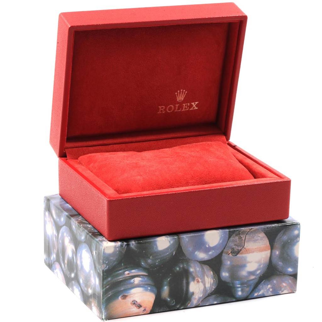 The image shows an open red Rolex Datejust 69173 Women's Stainless Steel Blue Dial 69173 Women's Stainless Steel Blue Dial watch box with an internal cushion, viewed from the front.