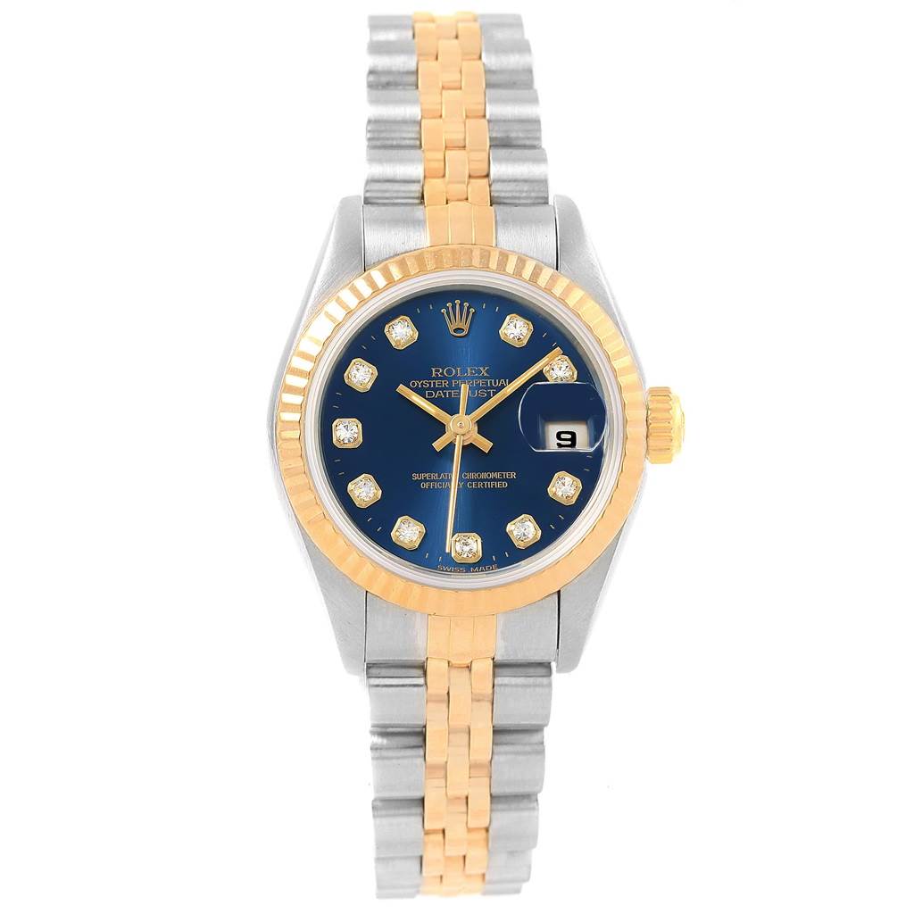 This image shows a Rolex Datejust 69173 Women's Stainless Steel Blue Dial 69173 Women's Stainless Steel Blue Dial watch from a top-down angle, highlighting its blue dial, gold fluted bezel, diamond markers, and two-tone bracelet.