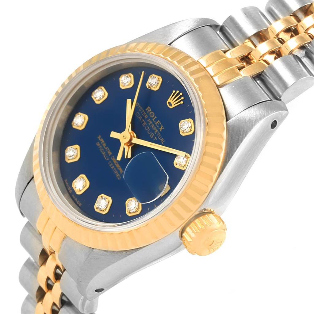 This image shows a close-up angle of the Rolex Datejust 69173 Women's Stainless Steel Blue Dial 69173 Women's Stainless Steel Blue Dial watch, highlighting the blue dial, gold fluted bezel, and two-tone bracelet.