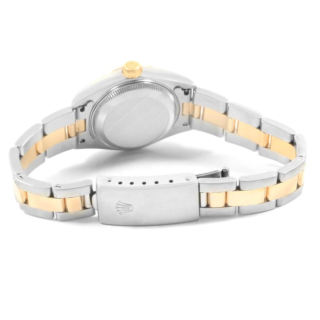 This image shows the back view of a Rolex Datejust 79163 Women's Steel and Gold (two tone) Silver Dial 79163 Women's Steel and Gold (two tone) Silver Dial watch, highlighting the case back and gold and silver bracelet with a closed clasp.