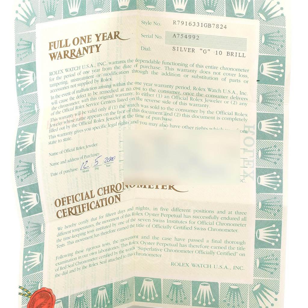 The image shows a full one-year warranty card for the Rolex Datejust 79163 Women's Steel and Gold (two tone) Silver Dial 79163 Women's Steel and Gold (two tone) Silver Dial model, detailing the certification and purchase information.