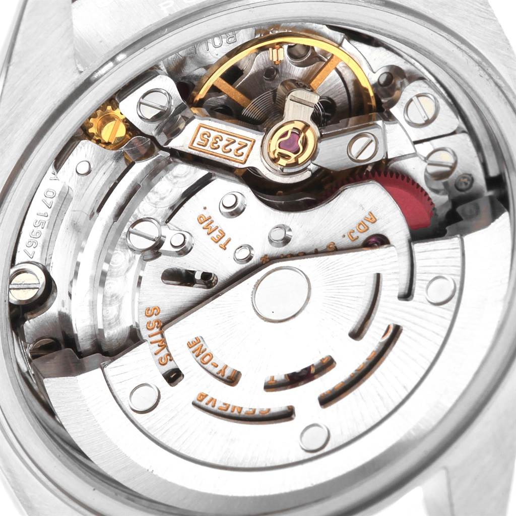 The image shows the intricate movement mechanism of the Rolex Datejust 79173 Women's Steel and Gold (two tone) Beige Dial 79173 Women's Steel and Gold (two tone) Beige Dial watch viewed from the back.