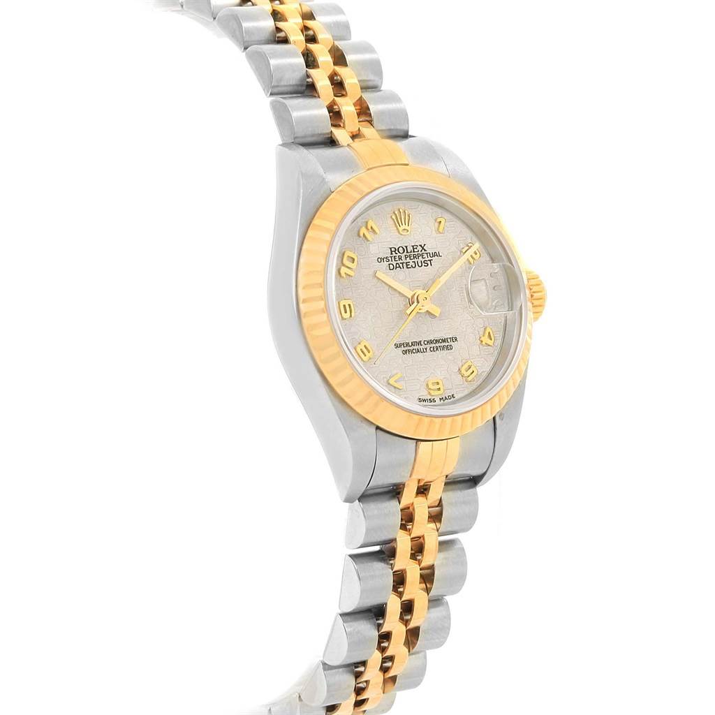 This image shows a Rolex Datejust 79173 Women's Steel and Gold (two tone) Beige Dial 79173 Women's Steel and Gold (two tone) Beige Dial watch from an angled side view, highlighting its bracelet, bezel, dial, and crown.
