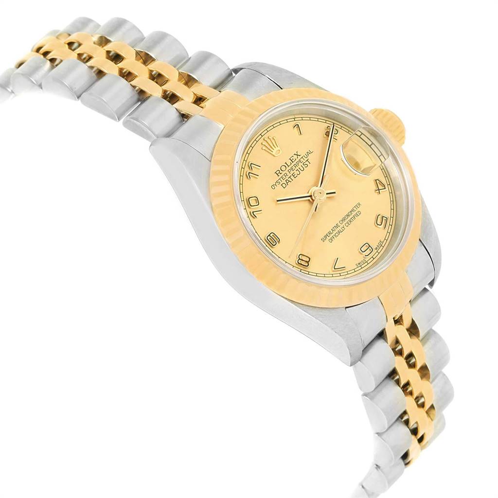 The image shows a Rolex Datejust 79173 Women's Steel and Gold (two tone) Champagne Dial 79173 Women's Steel and Gold (two tone) Champagne Dial watch at an angled side view, highlighting the dial, bezel, and part of the bracelet.