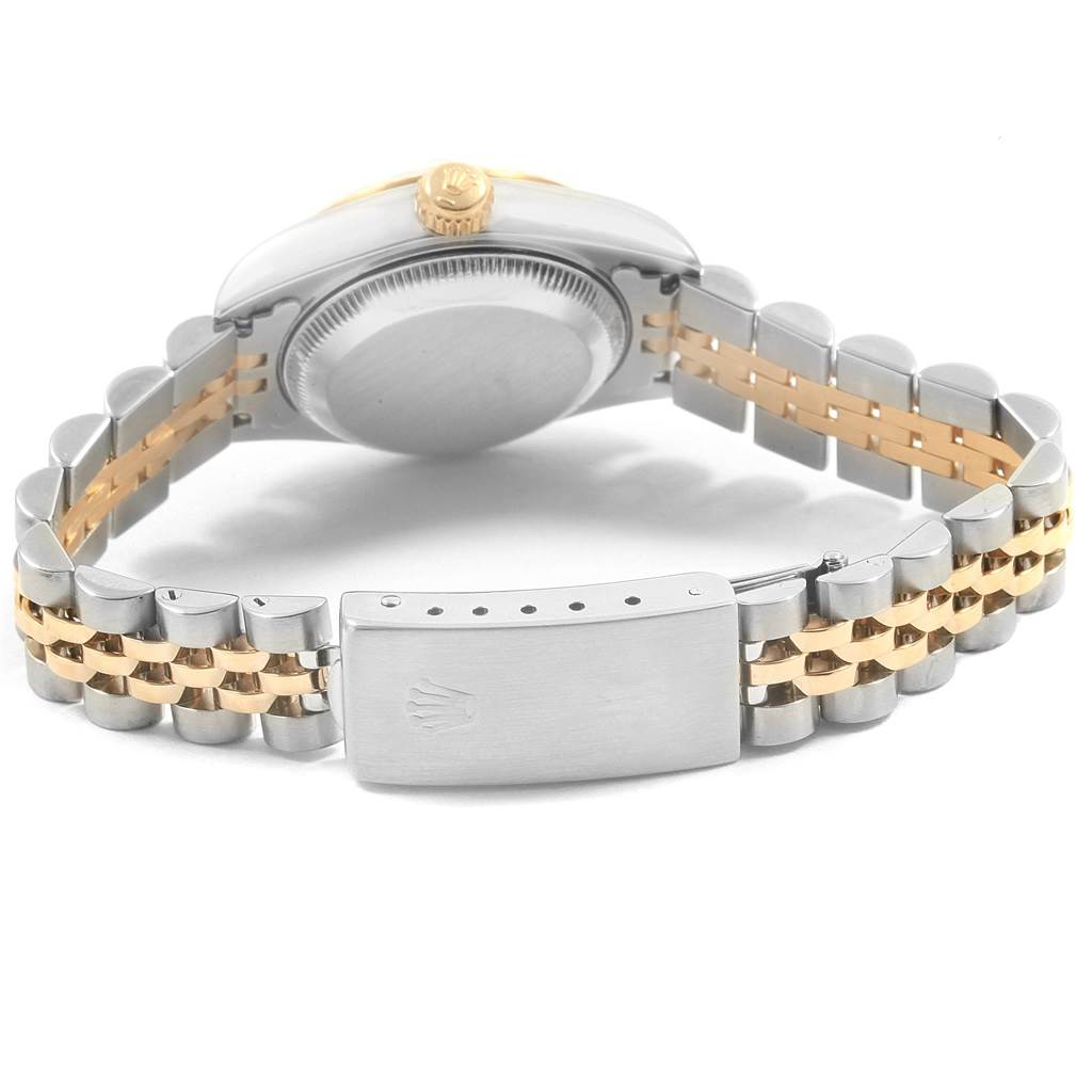 This image shows the Rolex Datejust 69173 Women's Stainless Steel White Dial 69173 Women's Stainless Steel White Dial watch from the rear, highlighting the case back, crown, and two-tone bracelet with the clasp.