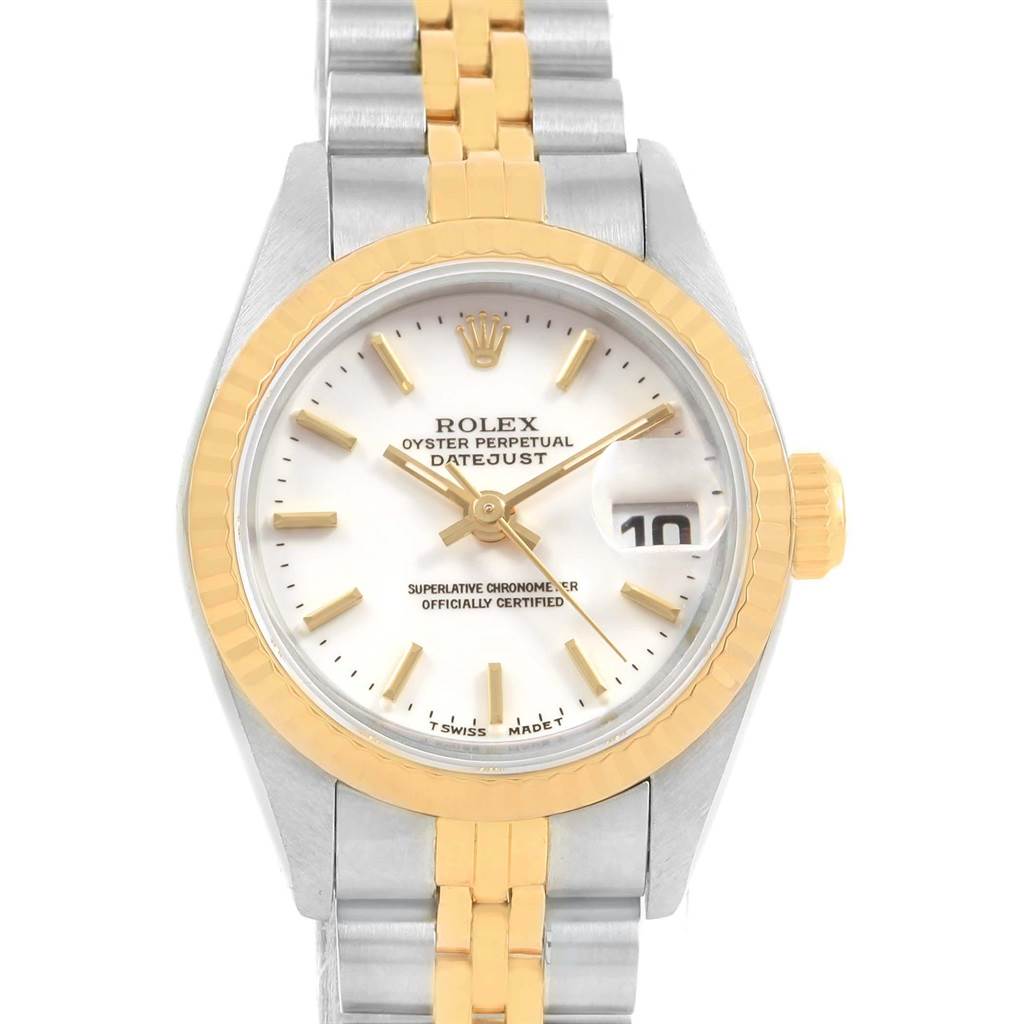 This is a Rolex Datejust 69173 Women's Stainless Steel White Dial 69173 Women's Stainless Steel White Dial watch shown from a top view, highlighting the dial, gold bezel, and part of the two-tone bracelet.