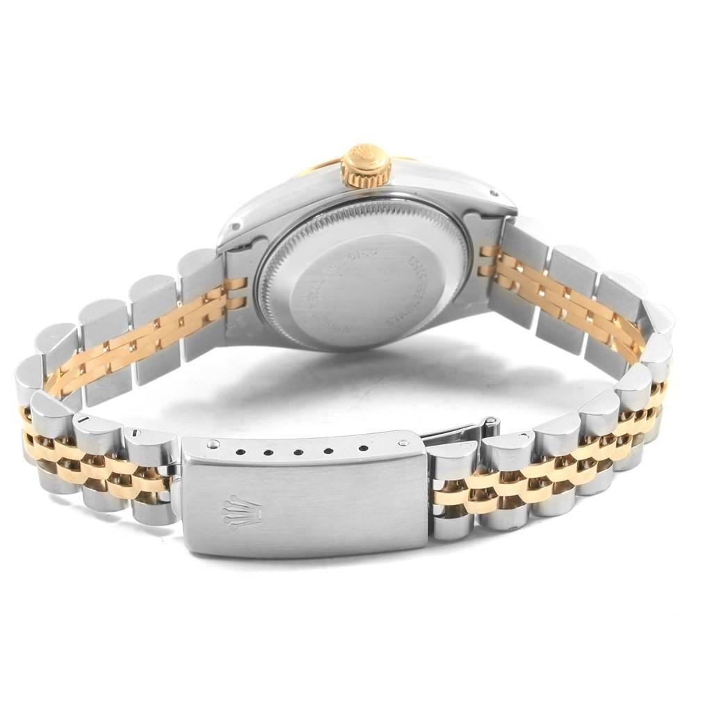 The image shows the back of a Rolex Datejust 69173 Women's Stainless Steel Black Dial 69173 Women's Stainless Steel Black Dial watch, highlighting its case back, bi-metal bracelet, and clasp.