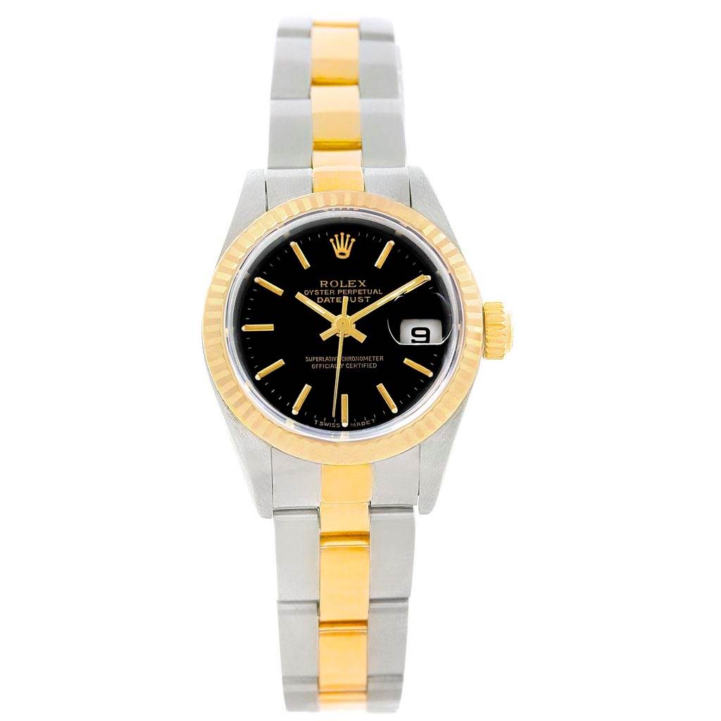 The image shows a frontal view of a Rolex Datejust 79173 Women
s Stainless Steel Black Dial 79173 Women
s Stainless Steel Black Dial watch featuring a black dial, fluted bezel, and two-tone metal bracelet.