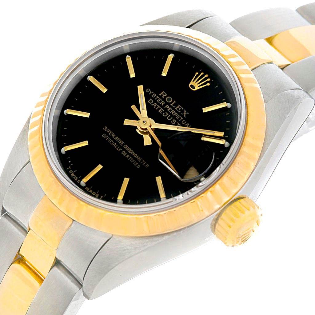 This image shows a close-up angled view of a Rolex Datejust 79173 Women
s Stainless Steel Black Dial 79173 Women
s Stainless Steel Black Dial watch, highlighting the dial, bezel, crown, and part of the bracelet.
