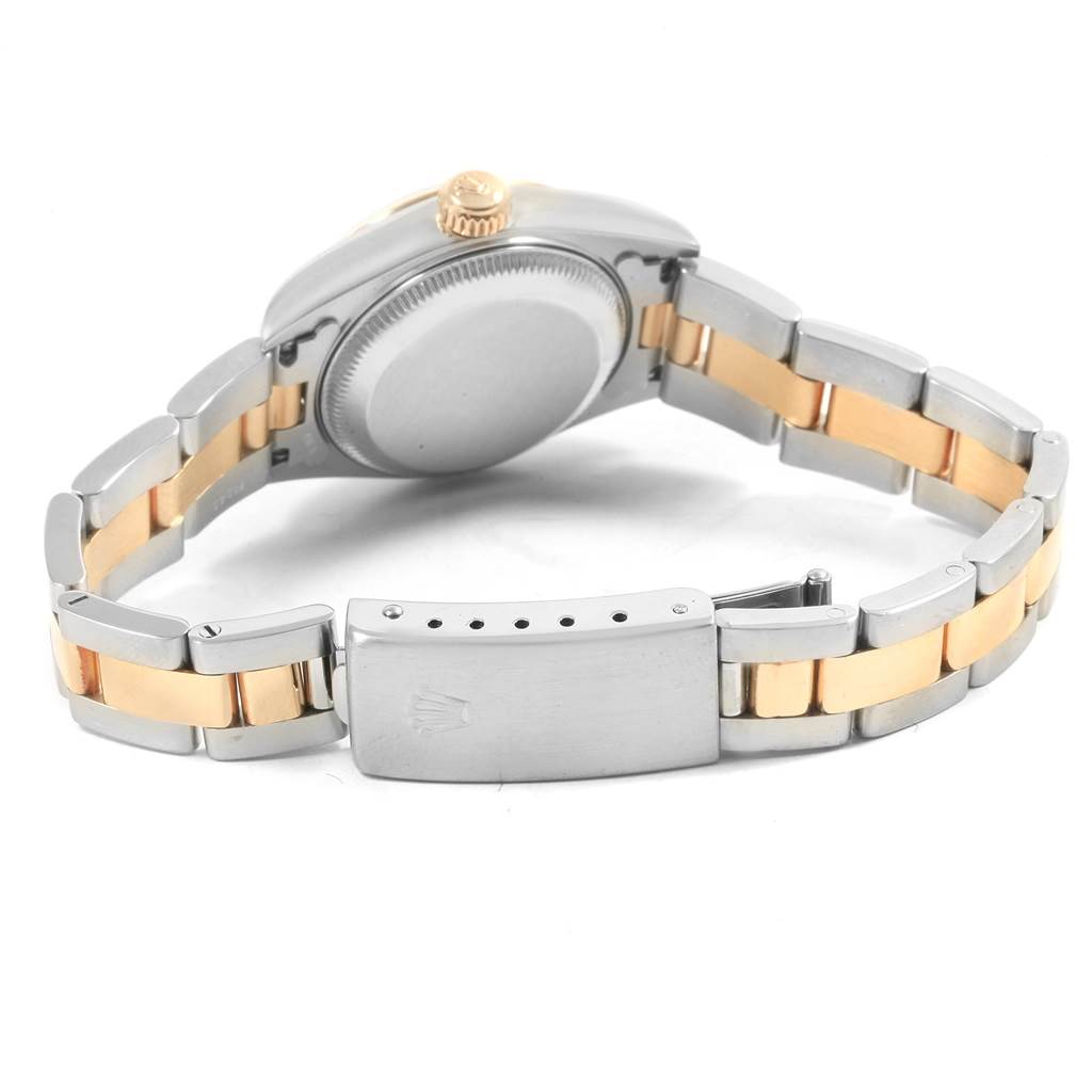 This image shows the Rolex Datejust 79173 Women's Steel and Gold (two tone) White Dial 79173 Women's Steel and Gold (two tone) White Dial watch from a rear angle, featuring its case back, crown, and two-tone metal bracelet with a clasp.