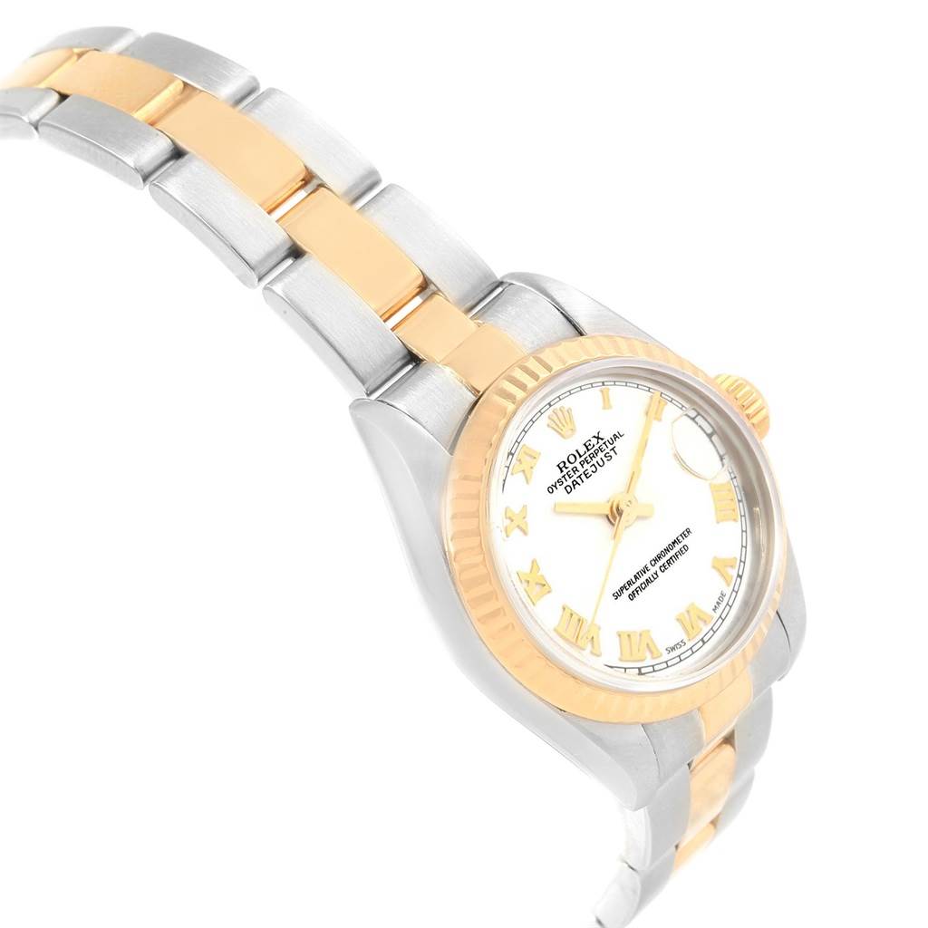 This image shows a Rolex Datejust 79173 Women's Steel and Gold (two tone) White Dial 79173 Women's Steel and Gold (two tone) White Dial watch, angled to display its face, bezel, and part of the two-tone bracelet.