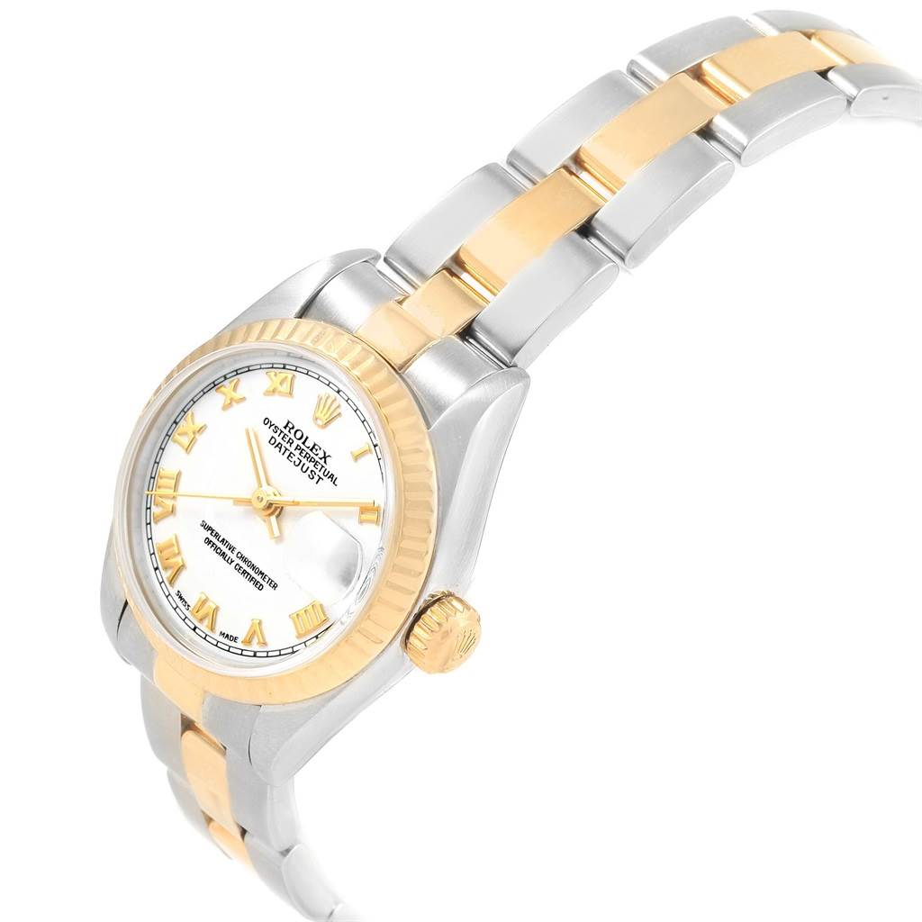 This image shows a Rolex Datejust 79173 Women's Steel and Gold (two tone) White Dial 79173 Women's Steel and Gold (two tone) White Dial watch at an angle displaying the face, bezel, crown, and part of the bracelet.