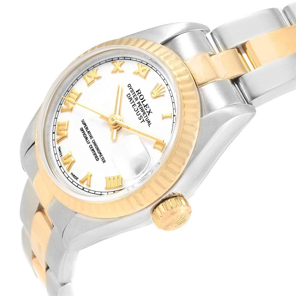 This image shows a close-up of the Rolex Datejust 79173 Women's Steel and Gold (two tone) White Dial 79173 Women's Steel and Gold (two tone) White Dial watch, highlighting the bezel, crown, and part of the bracelet.