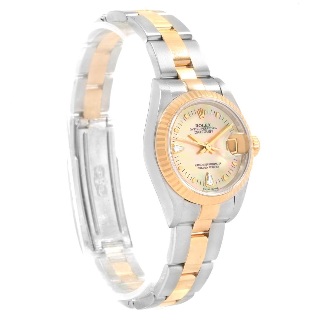 The Rolex Datejust 79173 Women's Stainless Steel Mother of Pearl Dial 79173 Women's Stainless Steel Mother of Pearl Dial watch is shown from a side angle, displaying its dial, bezel, crown, and two-tone bracelet.
